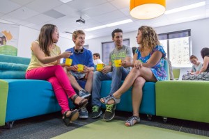 Common-room-ABILITY-students-holding-cups